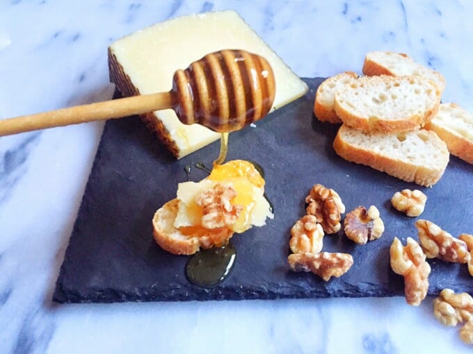 Cheese, honey, and walnut crostini