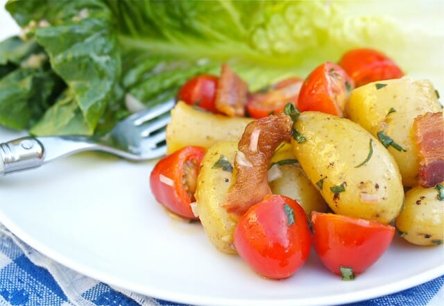 Potato Salad with Cherry Tomatoes and Bacon on a White Plate - Mom's Kitchen Handbook
