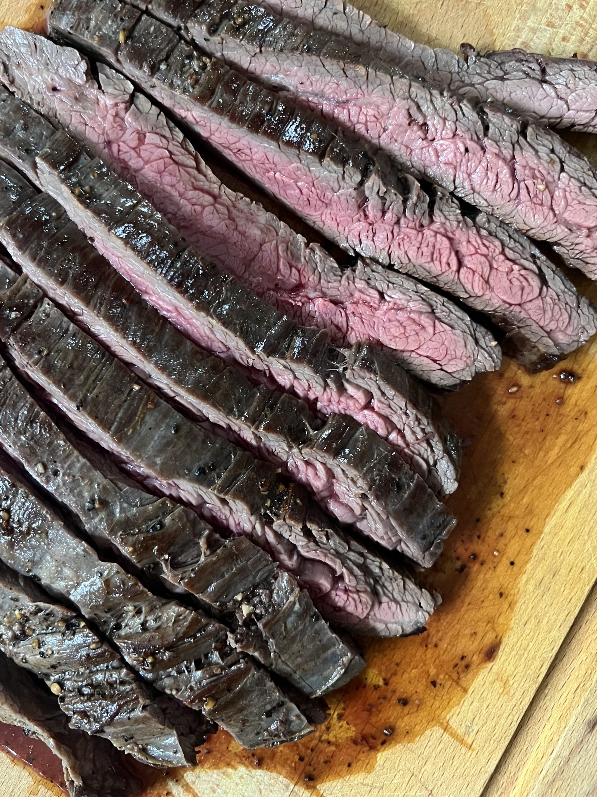 Steak on arugula with balsamic and parmesan