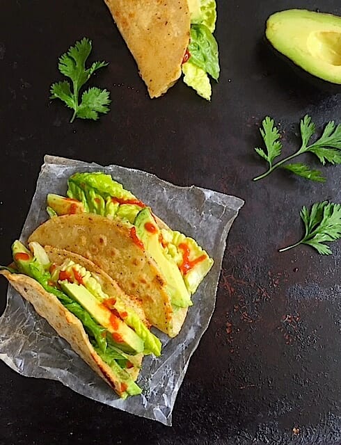 Two Crispy Avocado Tacos with salsa