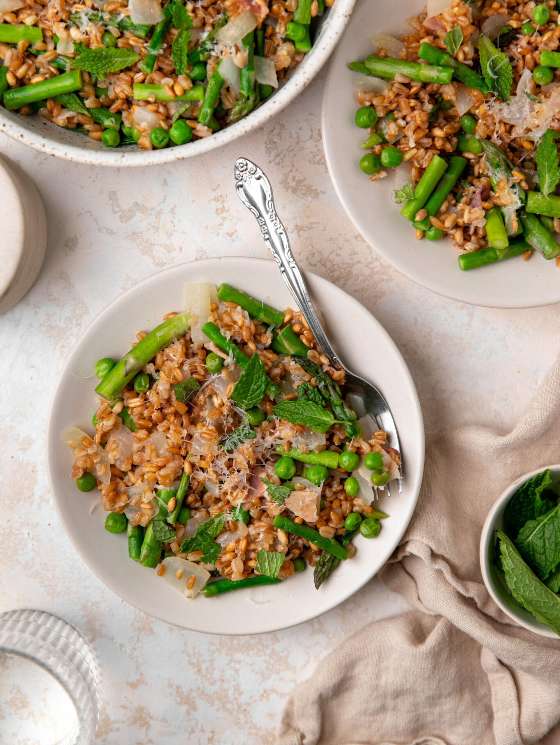 Farro risotto with asparagus and peas