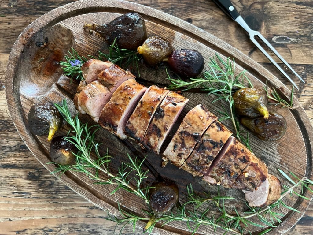 Sliced Pork Tenderloin on a cutting board