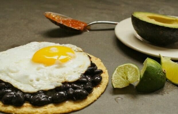 Quick breakfast tacos with a spoon and avocado