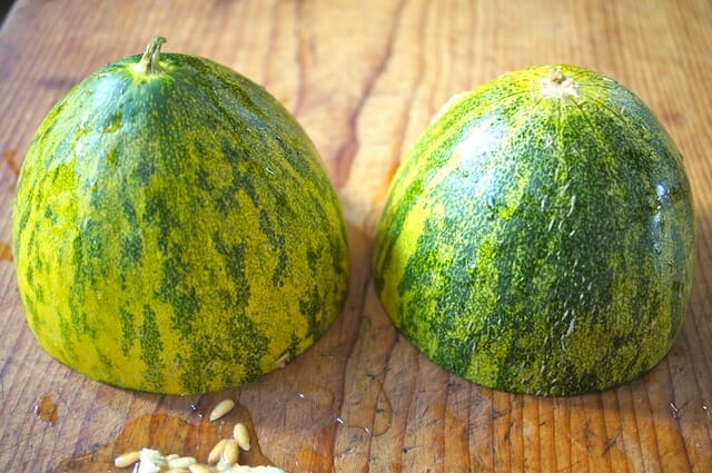 prepping a melon to be cut