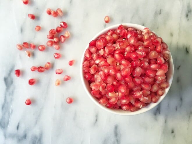 Bowl of tasty pomegranate seeds 