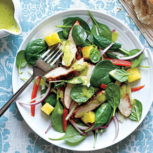 Grilled Chicken and Spinach Salad with Spicy Pineapple Dressing from Cooking Light.