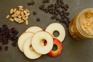 Fixings for peanut butter granola apple stacks