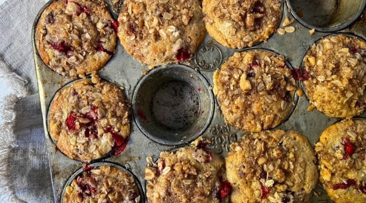 muffin tin of cranberry muffins