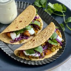 Two Lentil Tacos with cilantro and yogurt