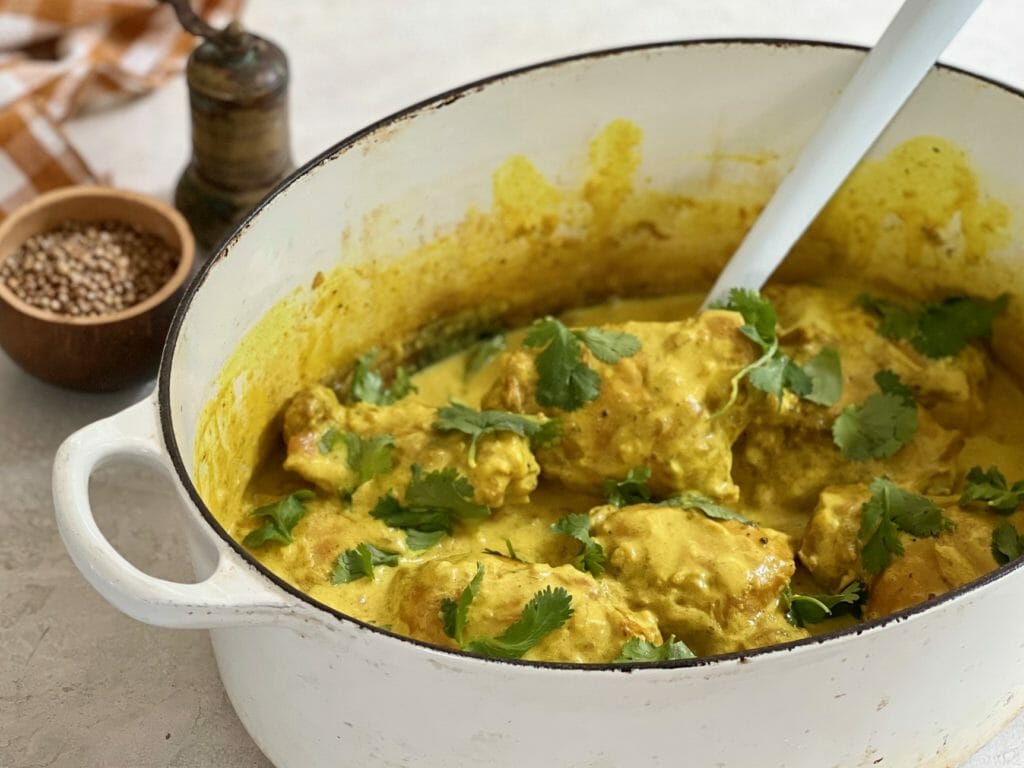 white pot of creamy afghan chicken