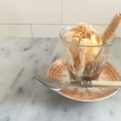 easy affogato in a glass with a pirouette cookie