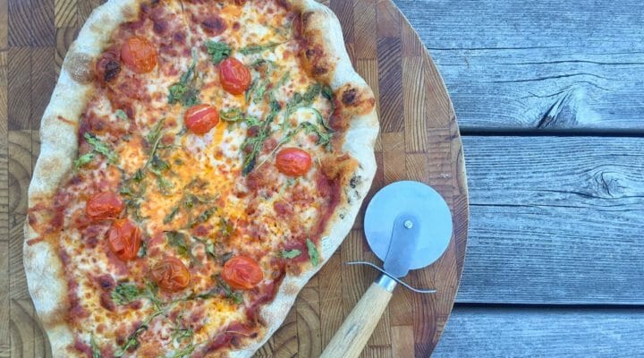 pizza on a cutting board