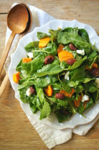 Winter Kale Salad with Roasted Grapes, Persimmons, and Goat Cheese