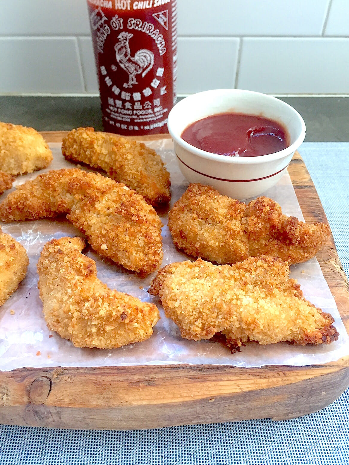 chicken fingers with sriracha ketchup makes a tasty meal or snack