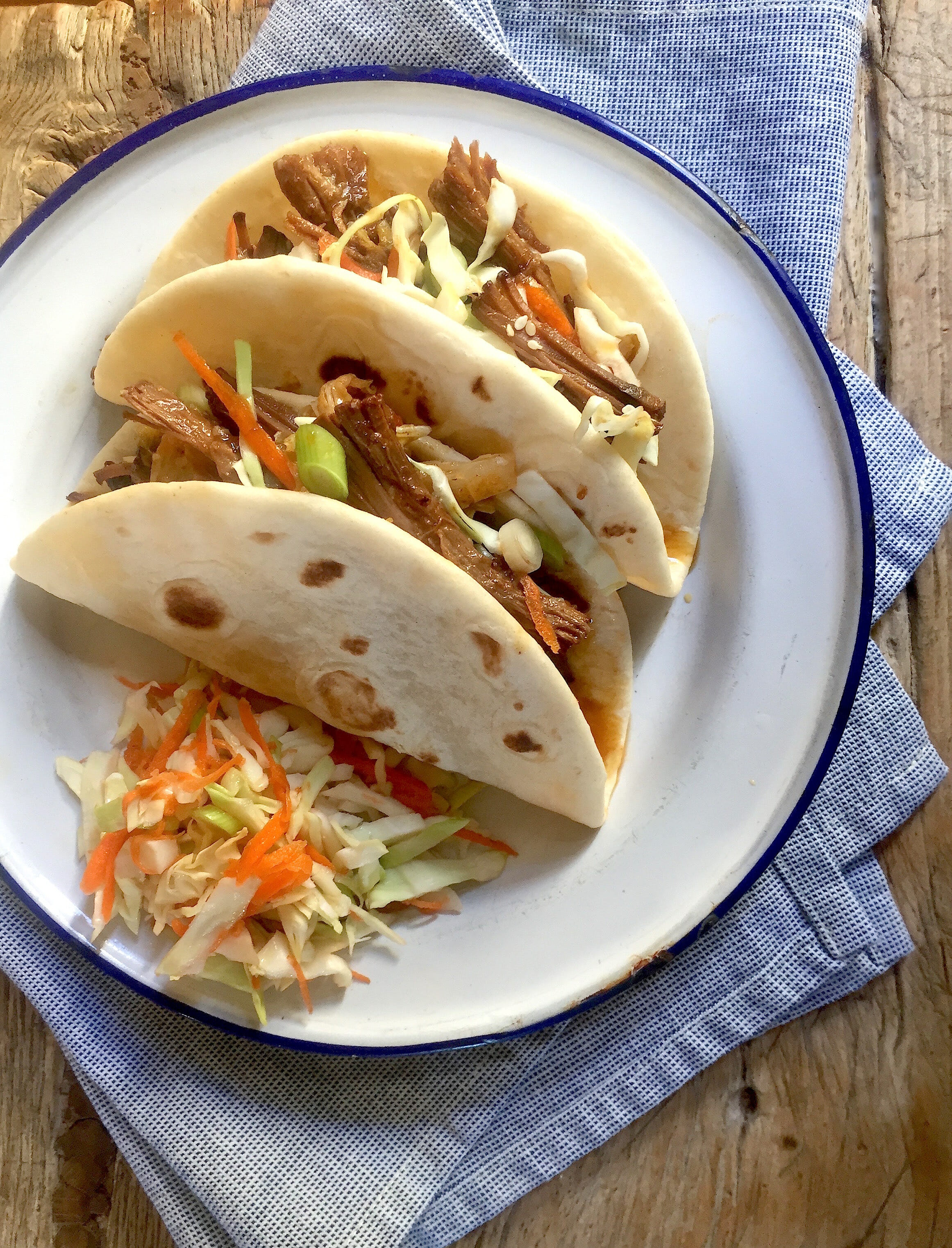 Instant Pot Korean Beef Tacos are tender and tasty, served with crispy slaw...