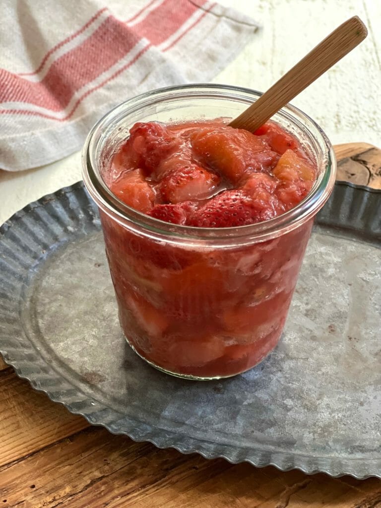 Glass jar with strawberry rhubarb compote