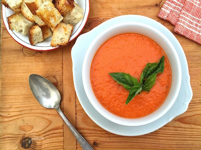 Bowl of Creamy Vegan Tomato Soup with Croutons