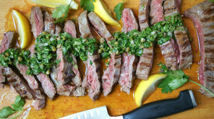 Sliced skirt steak with salsa verde