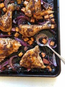 sheet pan of chicken with wild blueberries and sweet potatoes