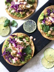 Cauliflower tostadas with red cabbage, lime, and cilantro