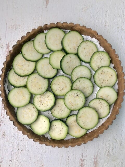 Layer of zucchini rounds in tart shell