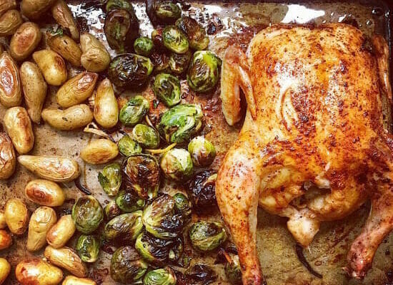 sheet pan chicken dinner with potatoes and brussels sprouts
