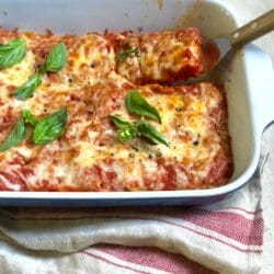 Casserole with spatula in Oven Baked Vegetarian Tofu Parmigiana
