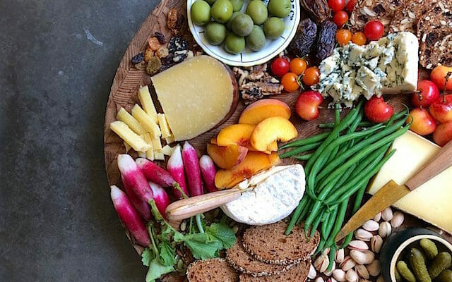 colorful cheese board with vegetables