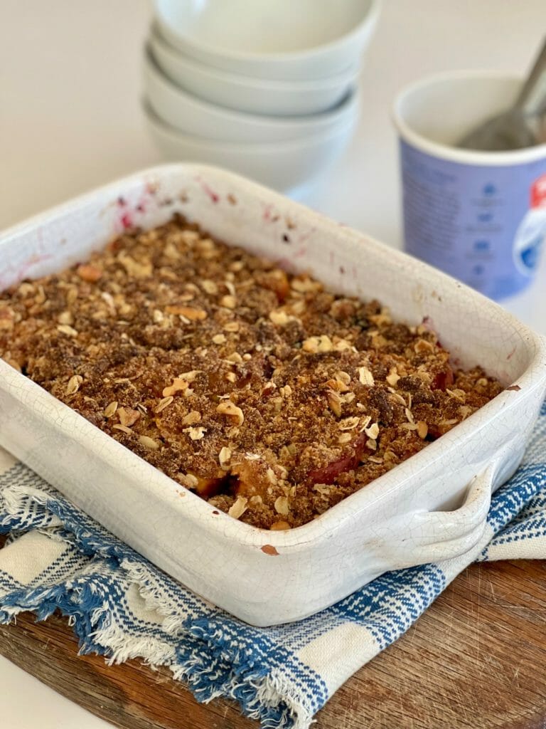 Summer fruit crisp with ice cream container