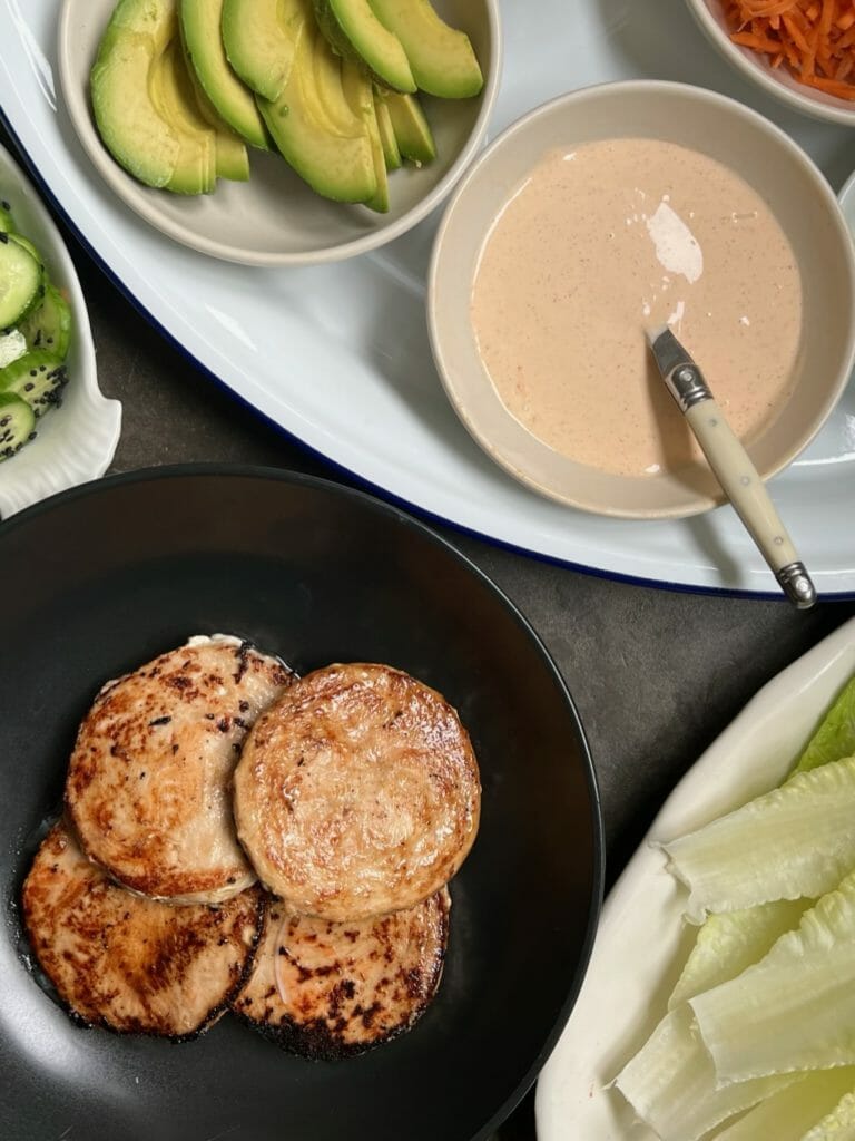 Frozen salmon burgers with lettuce wraps