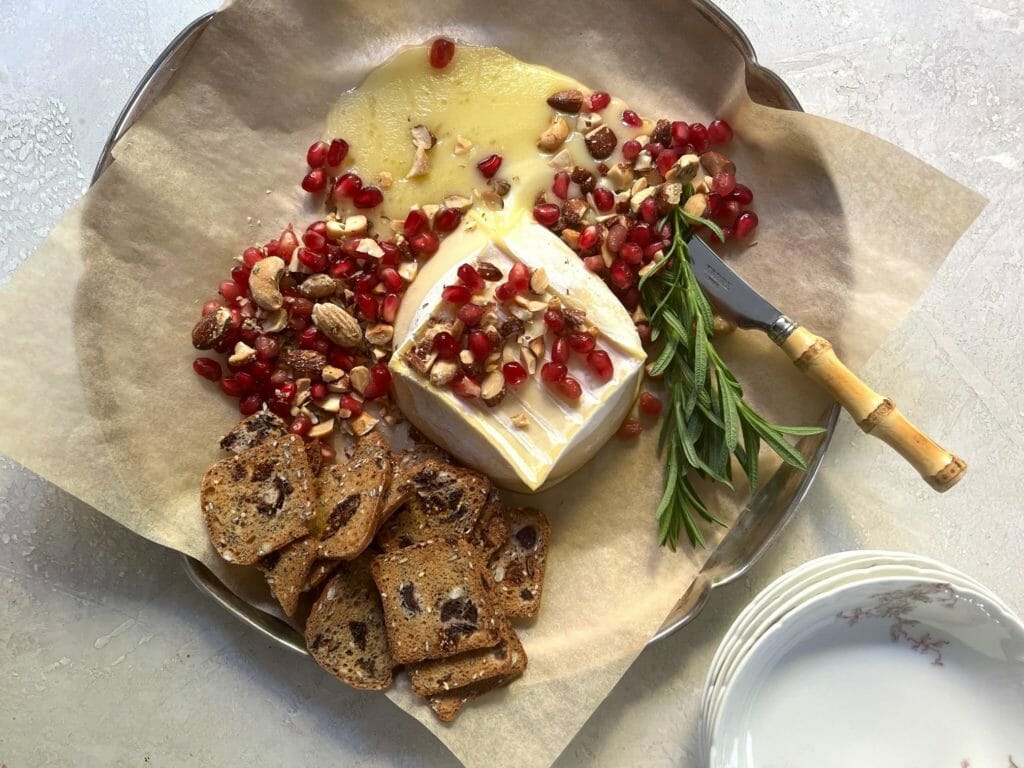 Baked brie with nuts and pomegranate