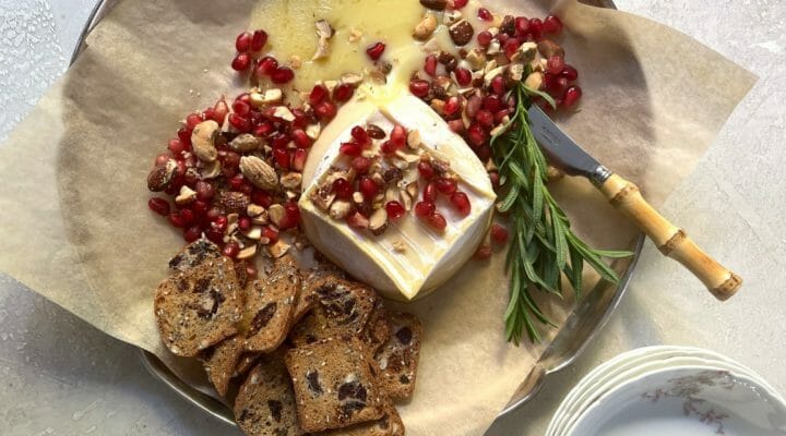 Baked brie with nuts and pomegranate