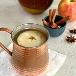 copper mug of spiced cider