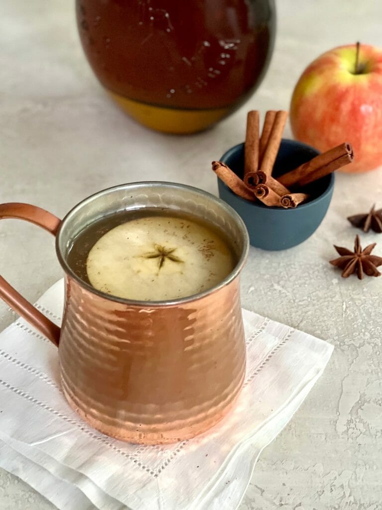 copper mug of spiced cider 