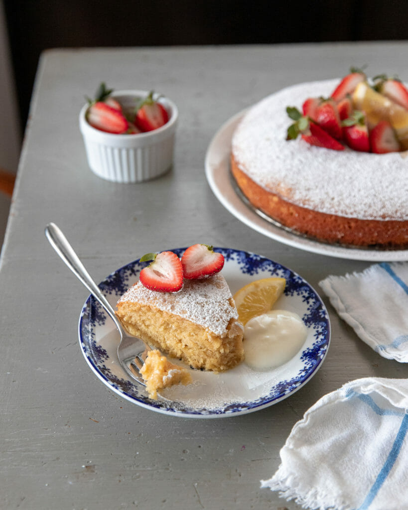 a slice of cake topped with strawberries