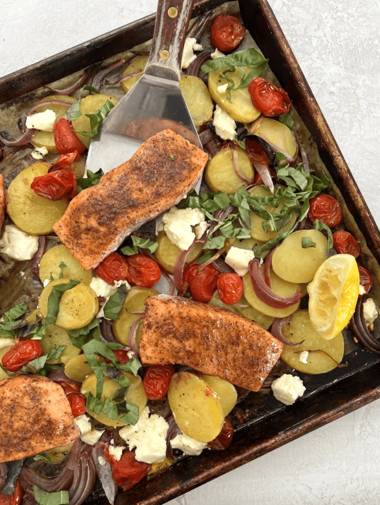 Sheet pan salmon with tomatoes and feta