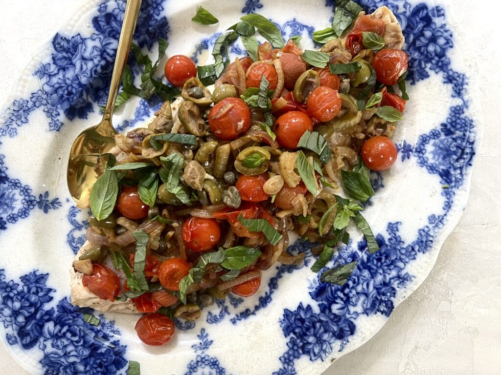 Fish in Parchment with tomatoes, capers, fennel, olives